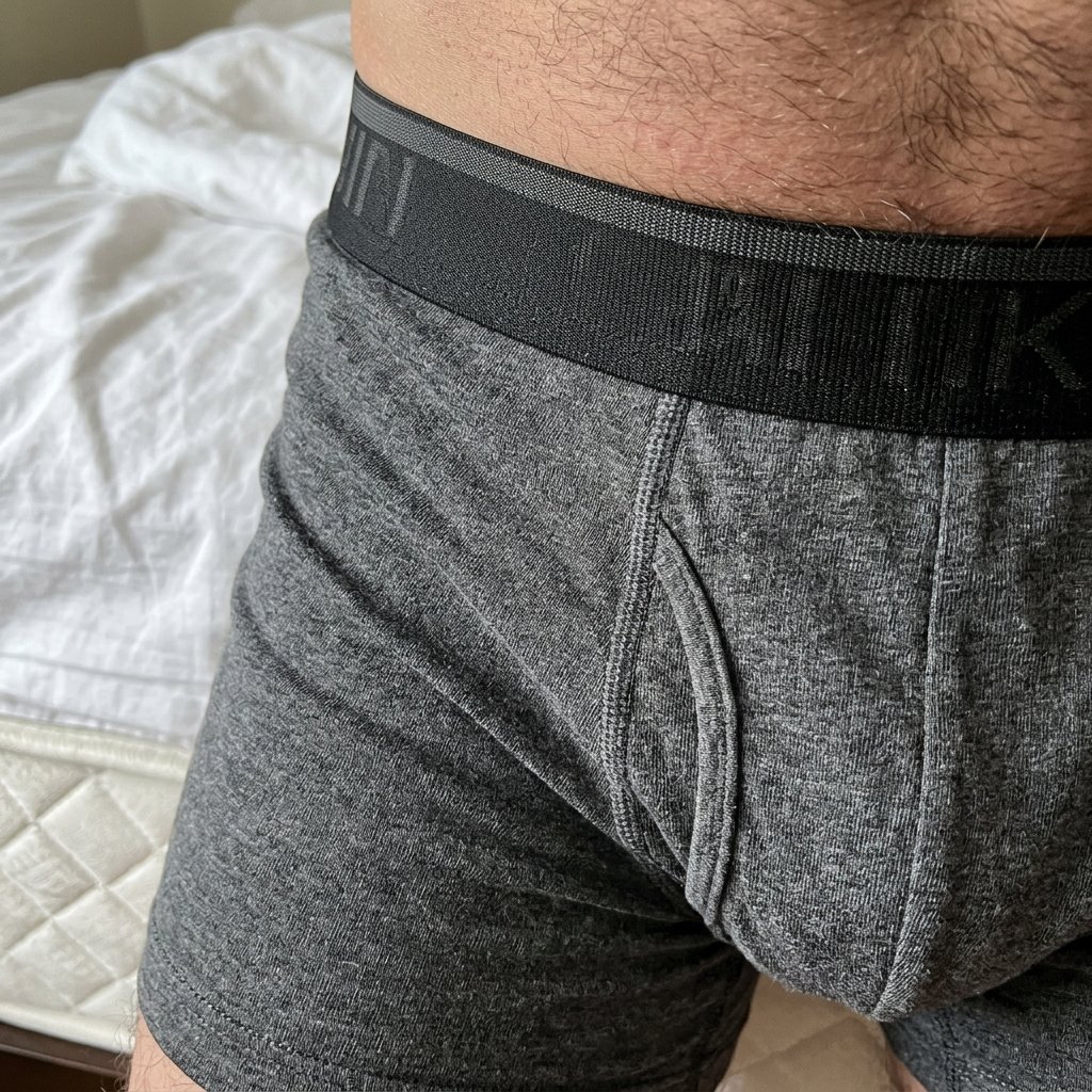 Cueca Boxer Cinza Cama Close-Up